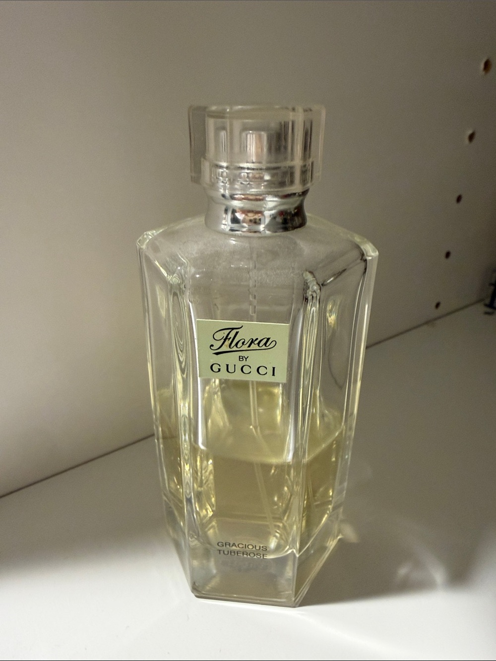 Gucci Flora Perfume Bottle with Pale Yellow Liquid
